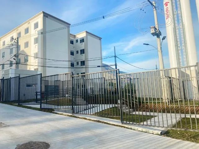 Foto Apartamento Em NI Cabuçu